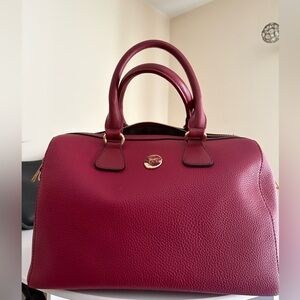 New without tags, Jessica Moore Berry colored Satchel with cross body strap